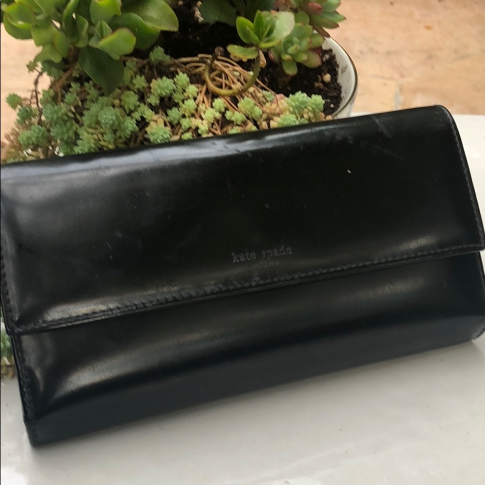 Black Kate spade wallet.